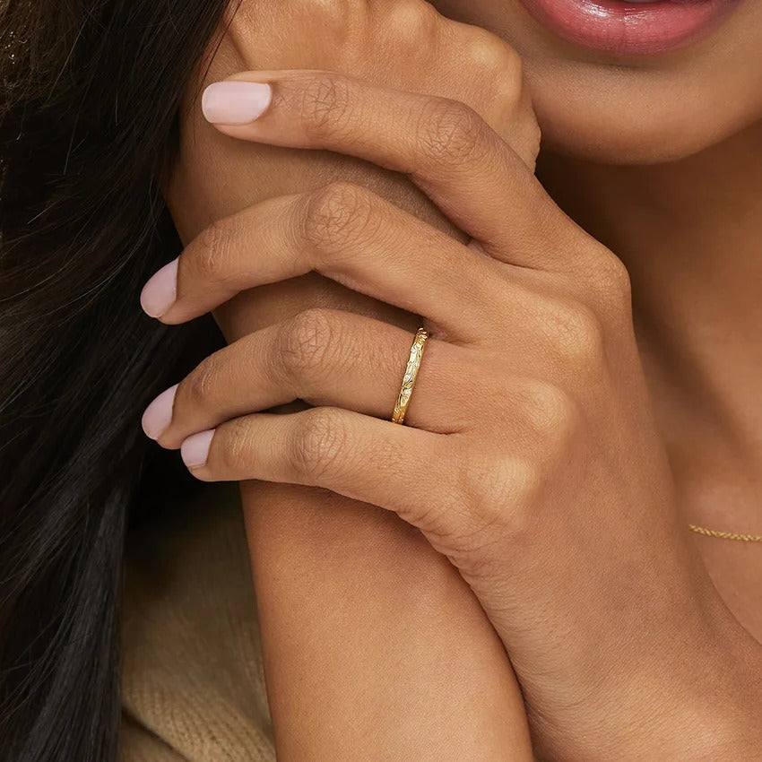 Gold Ring With Vine And Leaf Motifs